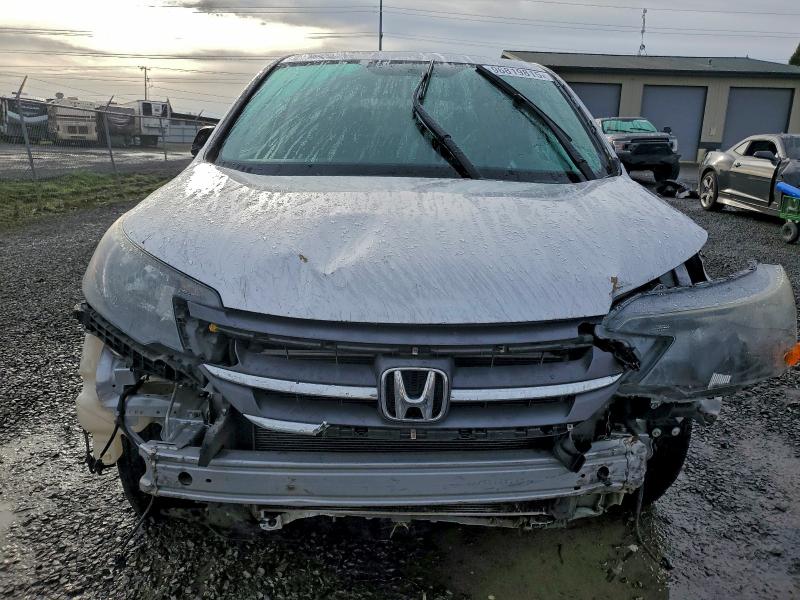 Photo 5 from auction – 2014 HONDA CR-V EX with VIN 2HKRM3H50EH551262