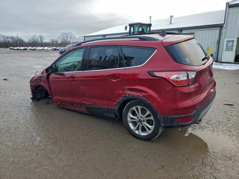 Photo 2 from auction – 2018 FORD ESCAPE with VIN 1FMCU9HD4JUD27312