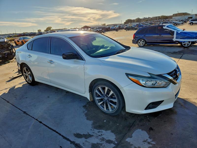 Photo 4 from auction – 2016 NISSAN ALTIMA 2.5 with VIN 1N4AL3AP1GC145619