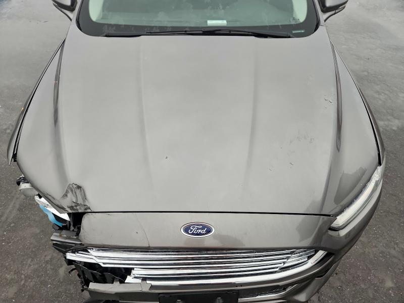 Photo 11 from auction – 2014 FORD FUSION TIT with VIN 3FA6P0D97ER364590