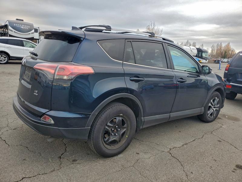 Photo 3 from auction – 2017 TOYOTA RAV4 LE with VIN 2T3BFREV7HW550917