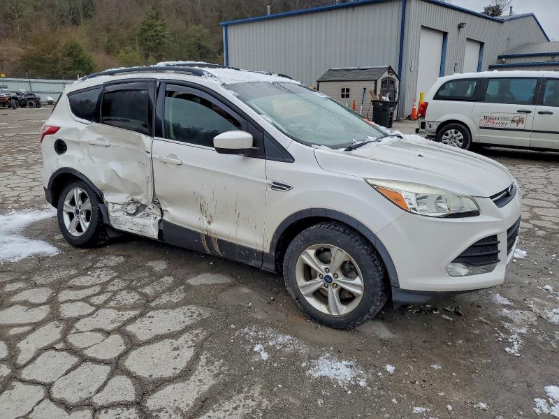 Photo 4 from auction – 2015 FORD ESCAPE SE with VIN 1FMCU9GX1FUA23552