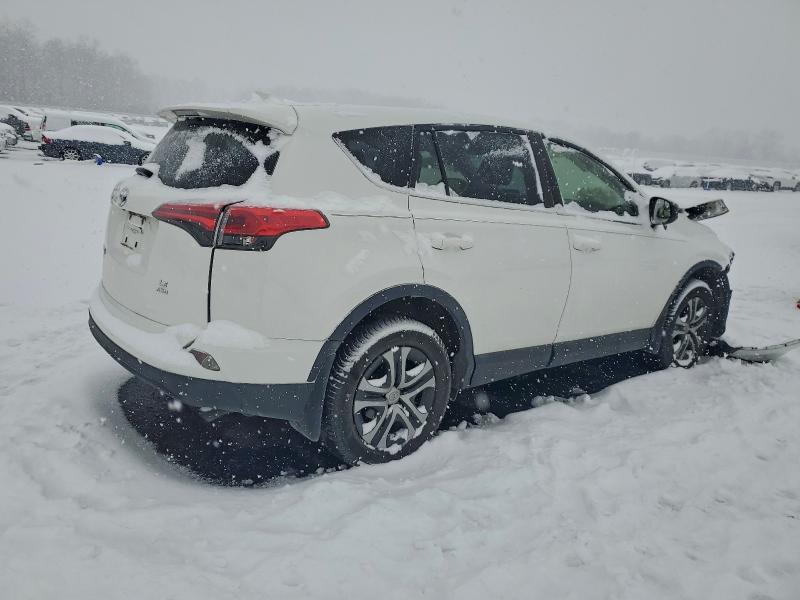 Photo 3 from auction – 2018 TOYOTA RAV4 LE with VIN JTMBFREV0JD243303
