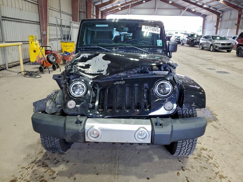 Photo 5 from auction – 2014 JEEP WRANGLER U with VIN 1C4BJWEG0EL197062