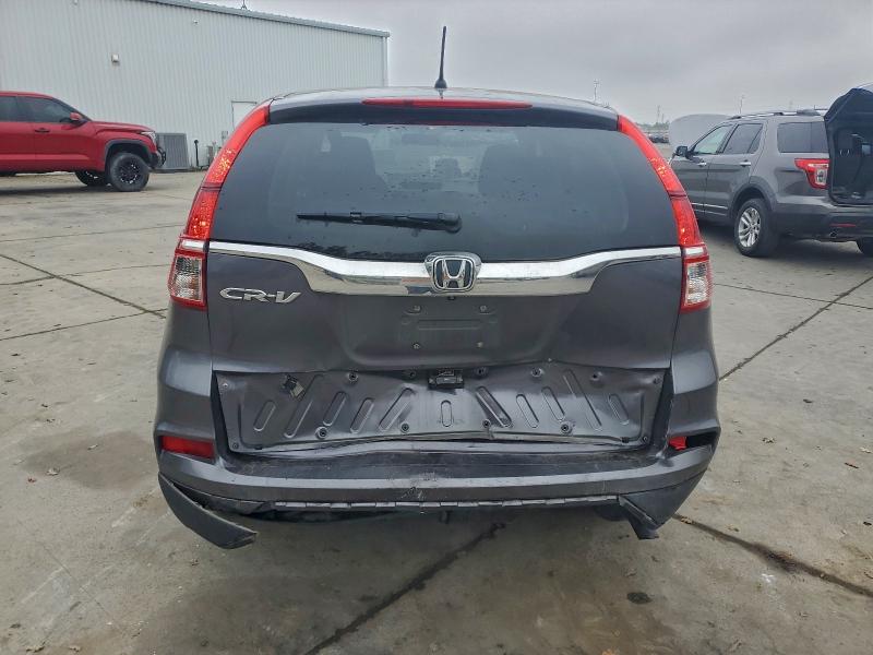 Photo 6 from auction – 2016 HONDA CR-V with VIN 2HKRM3H40GH508230