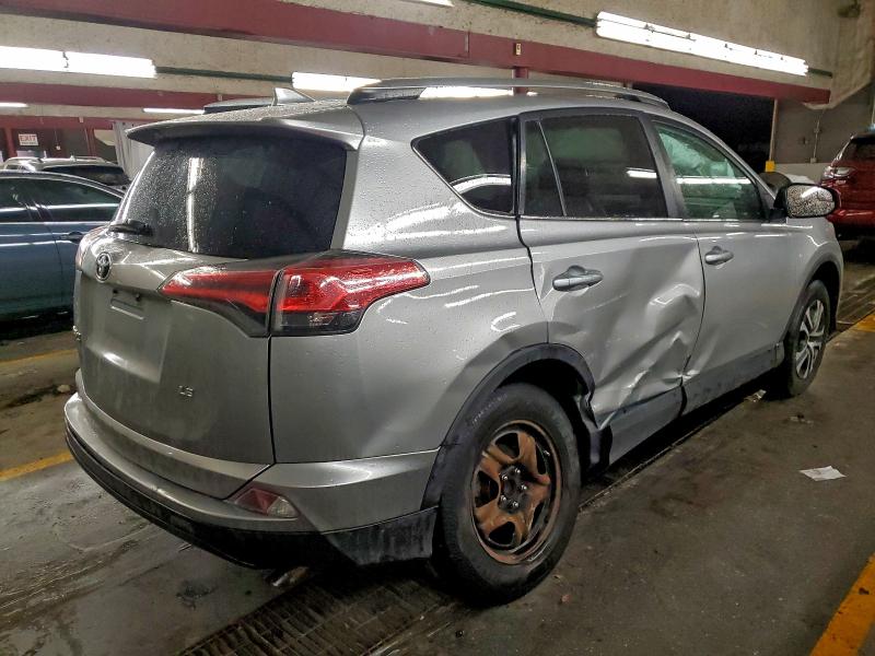 Photo 3 from auction – 2018 TOYOTA RAV4 LE with VIN 2T3ZFREV4JW407654