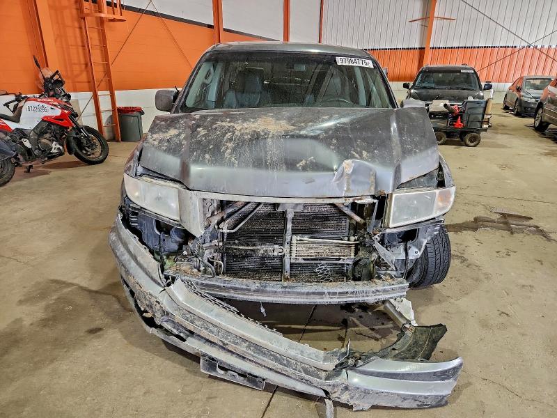 Photo 5 from auction – 2011 HONDA RIDGELINE with VIN 5FPYK1F54BB502995