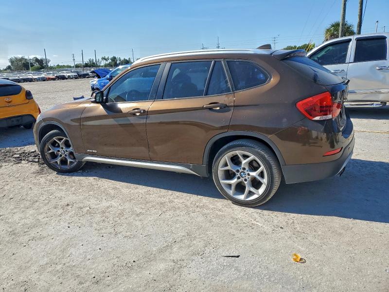 Photo 2 from auction – 2015 BMW X1 SDRIVE2 with VIN WBAVM1C59FV319364