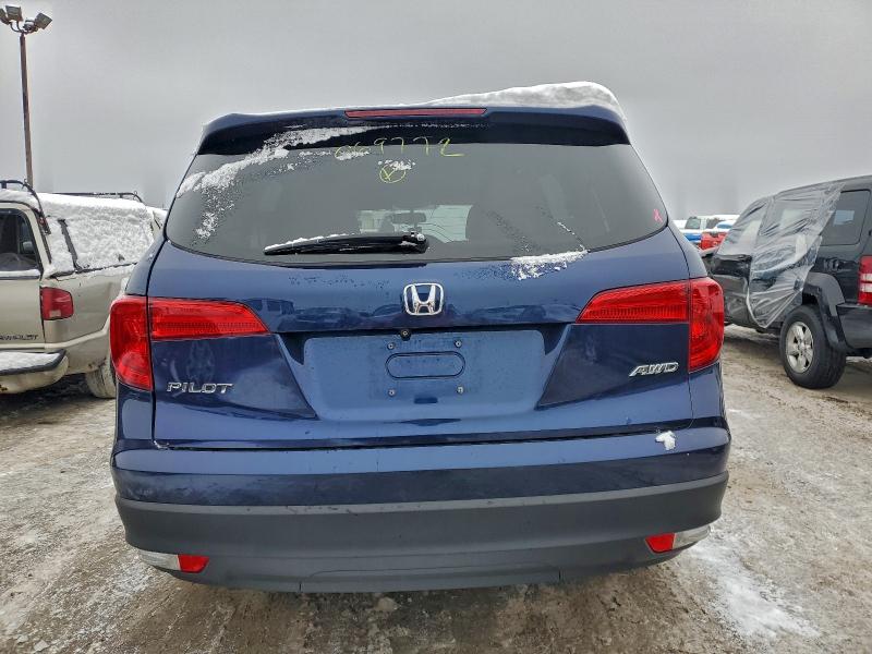 Photo 6 from auction – 2018 HONDA PILOT with VIN 5FNYF6H51JB069772