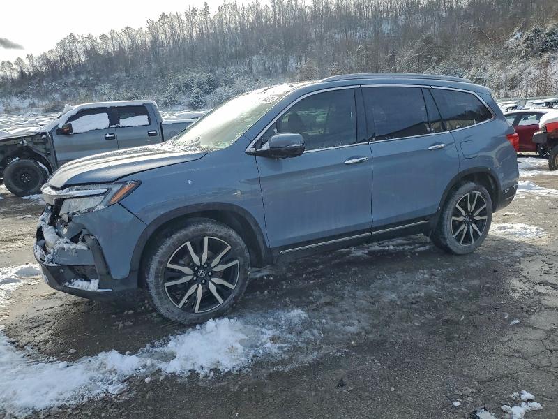 Photo 1 from auction – 2022 HONDA PILOT TOUR with VIN 5FNYF6H60NB042058