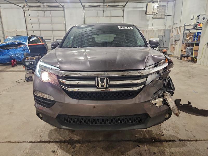 Photo 5 from auction – 2016 HONDA PILOT EXL with VIN 5FNYF6H52GB013560