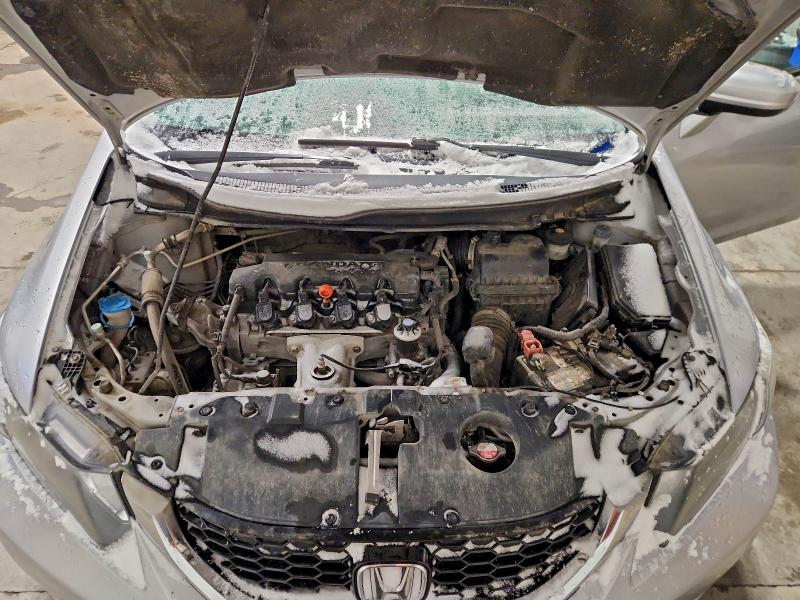 Photo 11 from auction – 2015 HONDA CIVIC LX with VIN 2HGFB2E54FH053374