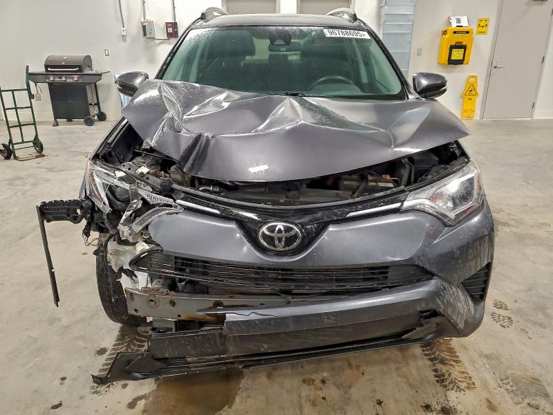 Photo 5 from auction – 2018 TOYOTA RAV4 LE with VIN 2T3BFREV2JW754367