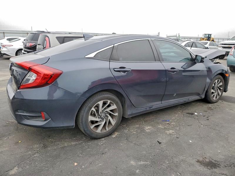 Photo 3 from auction – 2018 HONDA CIVIC EX with VIN 2HGFC2F74JH598030