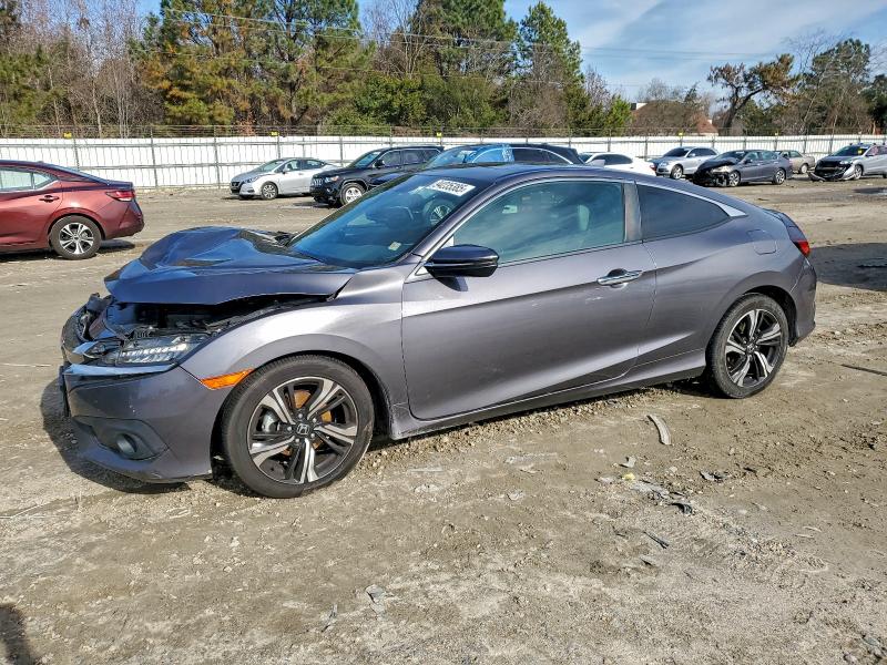 HONDA CIVIC TOUR 2018 with VIN 2HGFC3B96JH351394 - Photo from auction