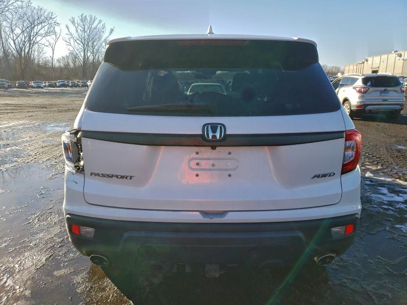 Photo 6 from auction – 2021 HONDA PASSPORT E with VIN 5FNYF8H53MB001831