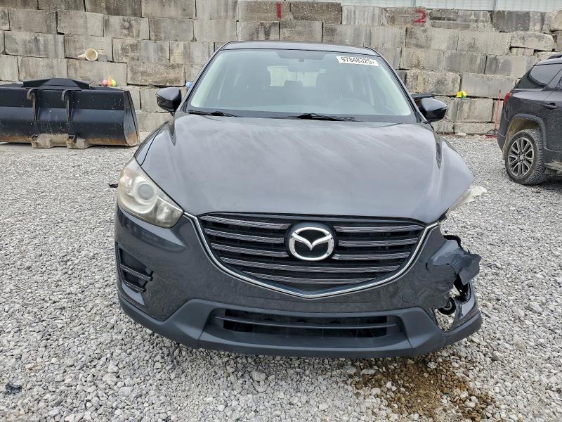 Photo 5 from auction – 2016 MAZDA CX-5 SPORT with VIN JM3KE2BE9G0758225