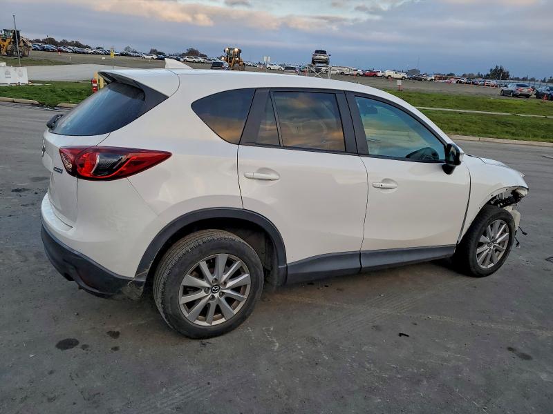 Photo 3 from auction – 2016 MAZDA CX-5 TOURI with VIN JM3KE2CYXG0788441