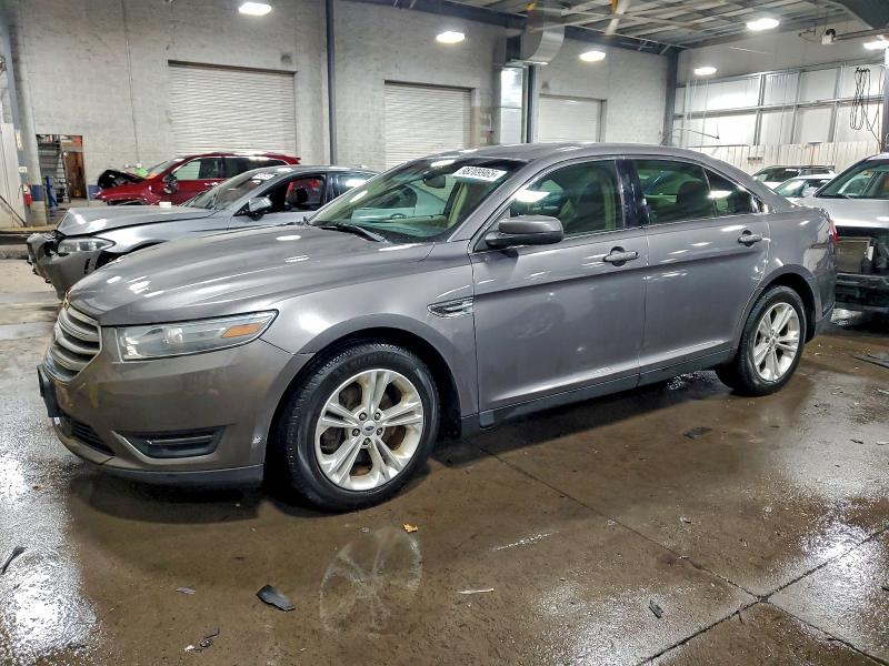 FORD TAURUS SEL 2014 with VIN 1FAHP2E8XEG137637 - Photo from auction