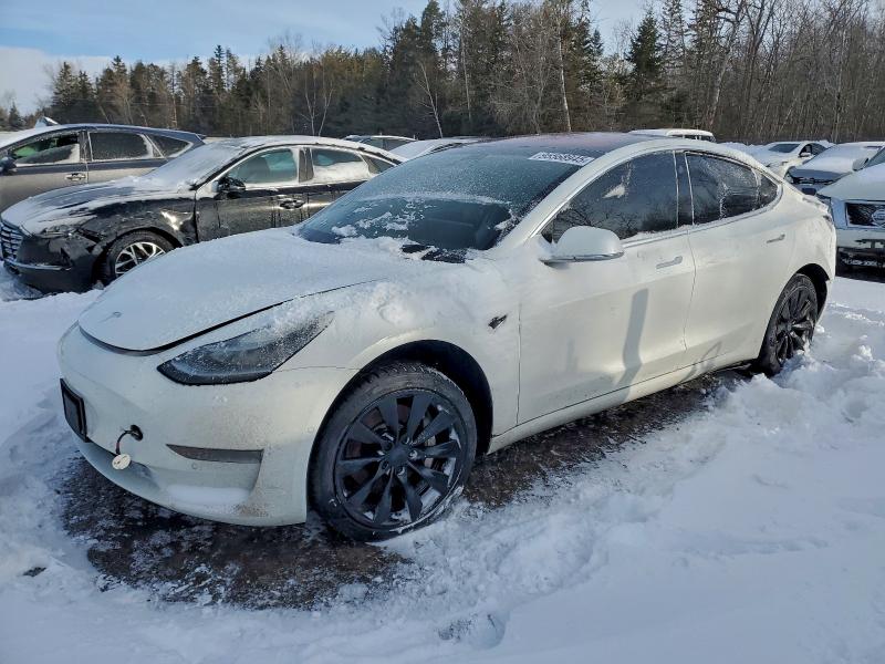 TESLA MODEL 3 2018 with VIN 5YJ3E1EA3JF027315 - Photo from auction