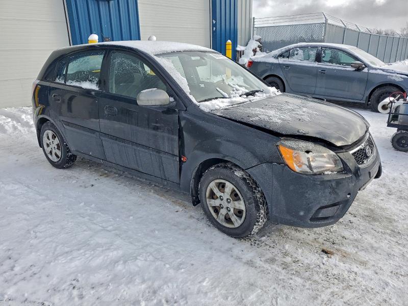 Photo 4 from auction – 2011 KIA RIO BASE with VIN KNADH5B35B6838598