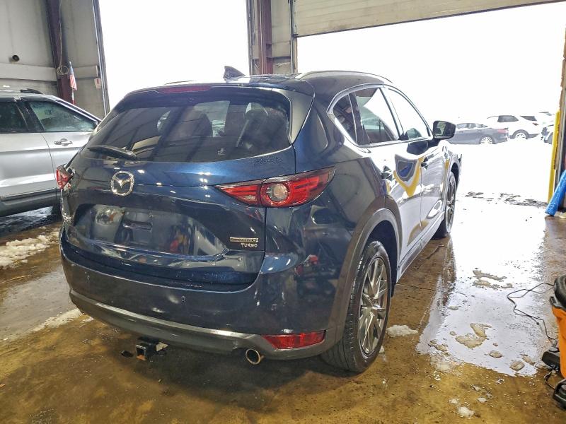 Photo 3 from auction – 2021 MAZDA CX-5 SIGNA with VIN JM3KFBEY0M0459379