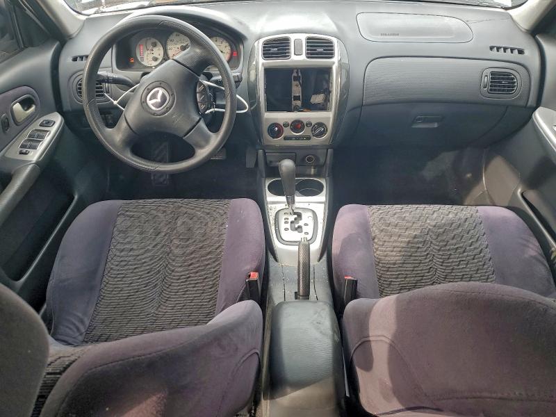 Photo 8 from auction – 2003 MAZDA PROTEGE DX with VIN JM1BJ226131116034