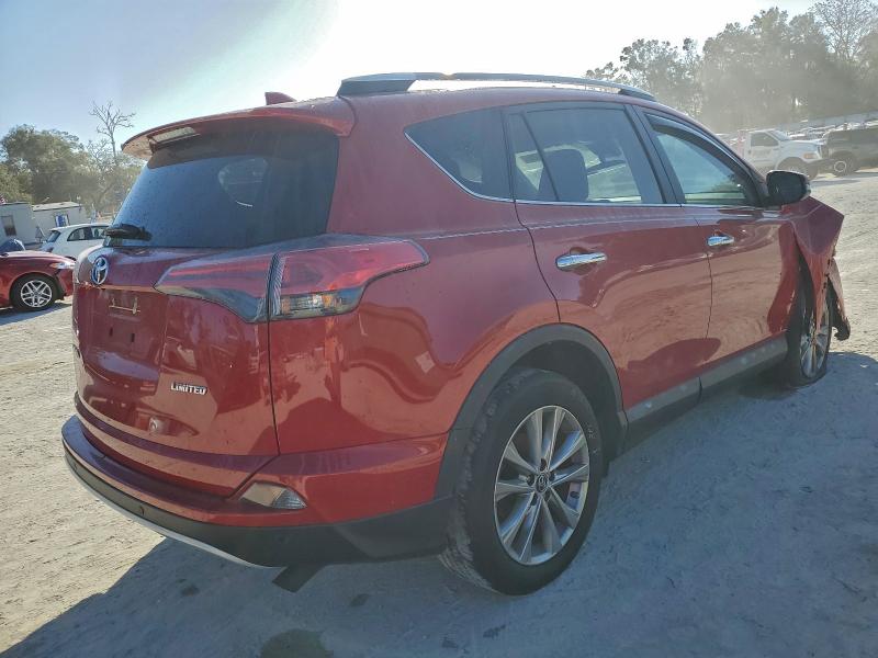 Photo 3 from auction – 2016 TOYOTA RAV4 LIMIT with VIN 2T3YFREV0GW310875