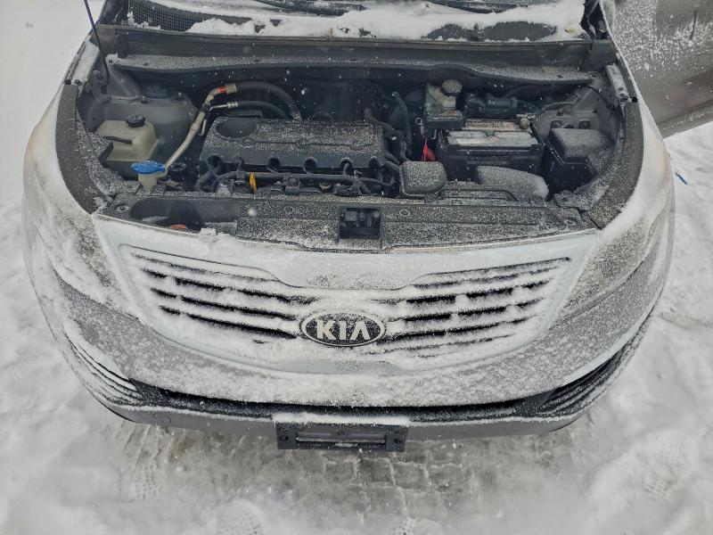 Photo 11 from auction – 2013 KIA SPORTAGE L with VIN KNDPBCA20D7499387