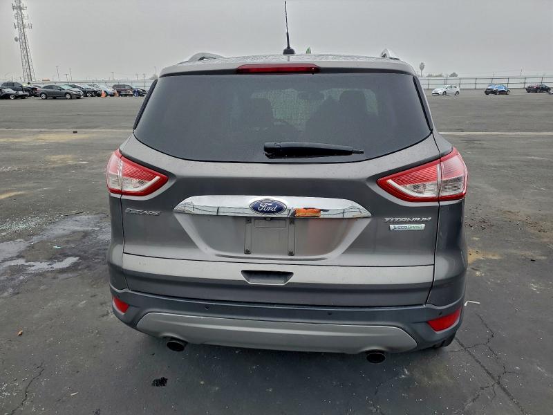 Photo 6 from auction – 2014 FORD ESCAPE TIT with VIN 1FMCU0J98EUB47919