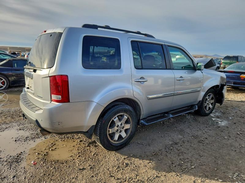 Photo 3 from auction – 2010 HONDA PILOT TOUR with VIN 5FNYF3H84AB021188