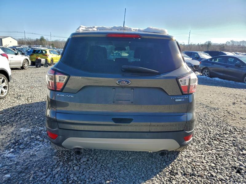 Photo 6 from auction – 2017 FORD ESCAPE TIT with VIN 1FMCU9JD4HUB94071