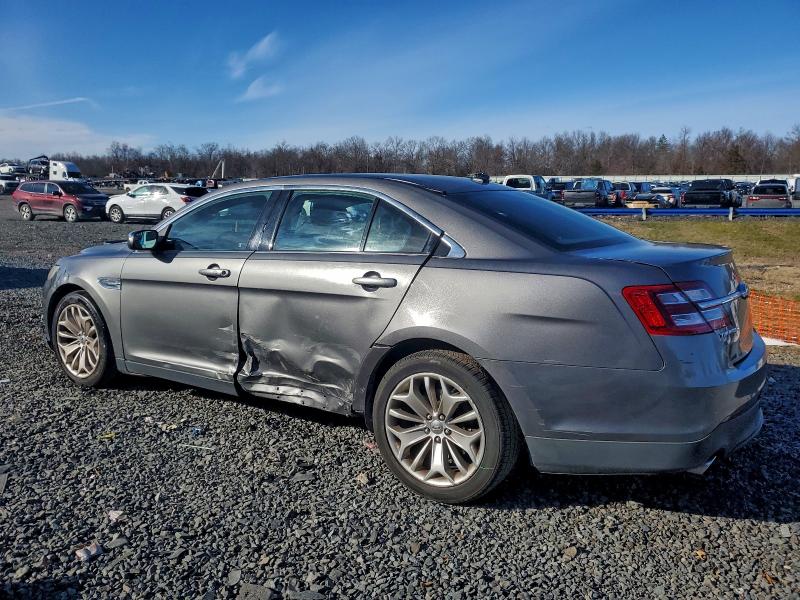 Photo 2 from auction – 2014 FORD TAURUS LIM with VIN 1FAHP2F84EG183026