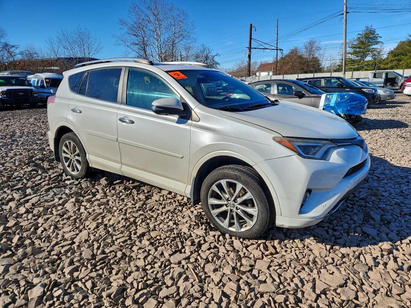 Photo 4 from auction – 2017 TOYOTA RAV4 LIMIT with VIN 2T3DFREV7HW558024