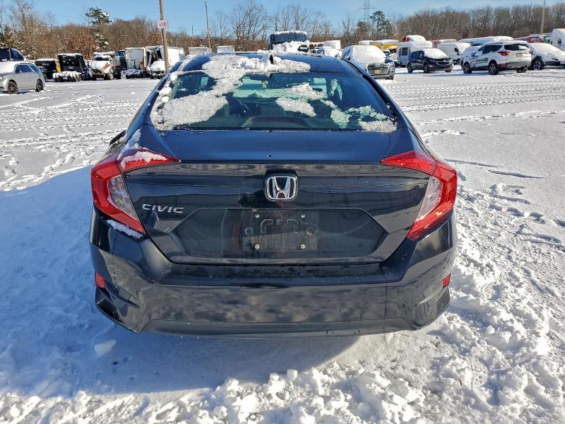 Photo 6 from auction – 2017 HONDA CIVIC EX with VIN 19XFC2F74HE206023