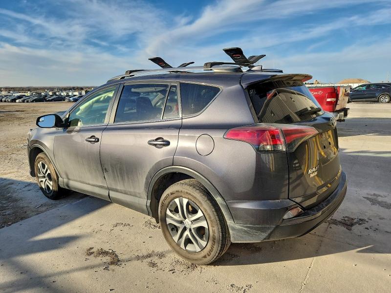 Photo 2 from auction – 2018 TOYOTA RAV4 LE with VIN JTMBFREV7JJ729396
