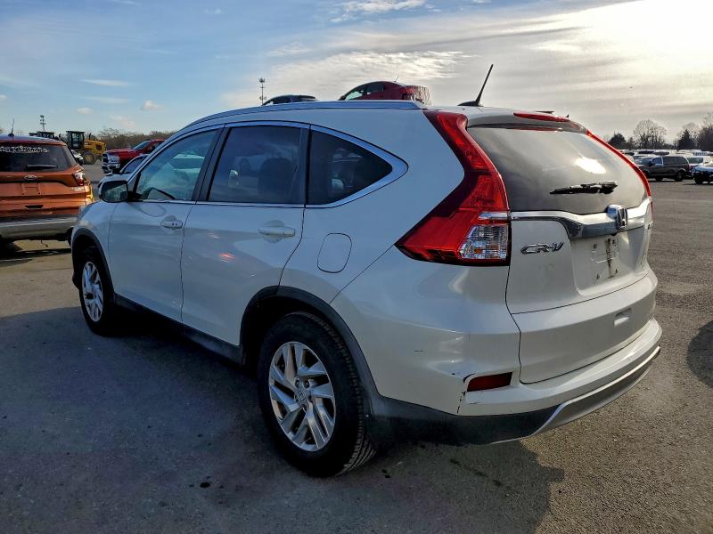 Photo 2 from auction – 2015 HONDA CR-V EXL with VIN 5J6RM4H77FL005475