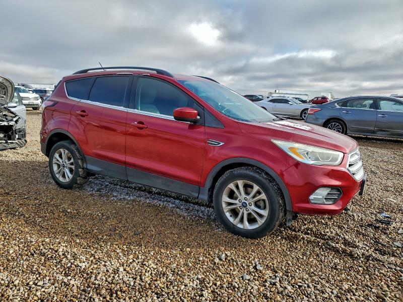 Photo 4 from auction – 2018 FORD ESCAPE SEL with VIN 1FMCU0HD6JUA63795