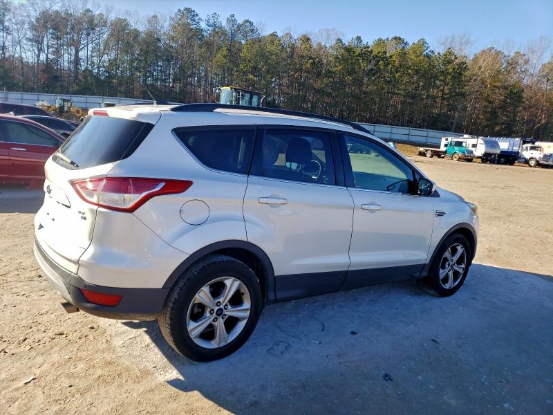 Photo 3 from auction – 2015 FORD ESCAPE SE with VIN 1FMCU9GX6FUC00595