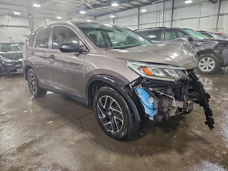 Photo 4 from auction – 2016 HONDA CR-V SE with VIN 5J6RM4H48GL119556