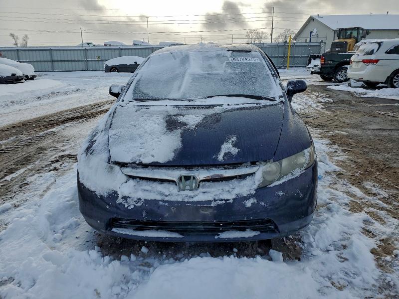 Photo 5 from auction – 2011 HONDA CIVIC LX with VIN 2HGFA1F57BH521362