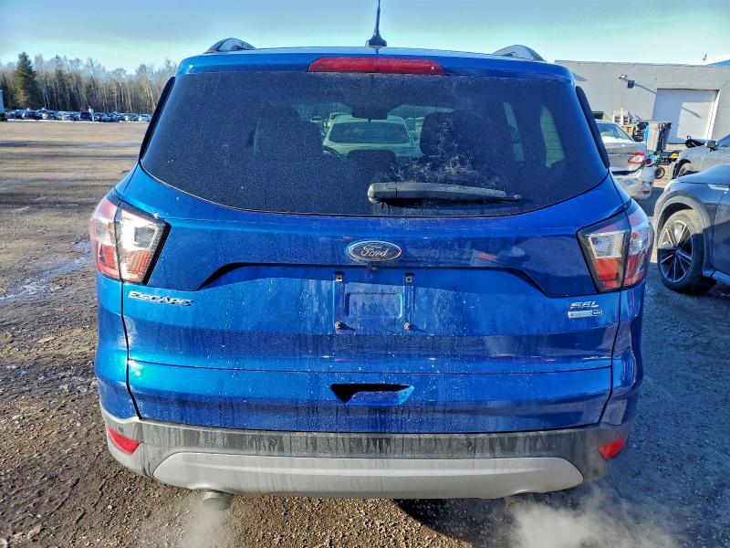Photo 6 from auction – 2018 FORD ESCAPE SEL with VIN 1FMCU9H92JUB56281