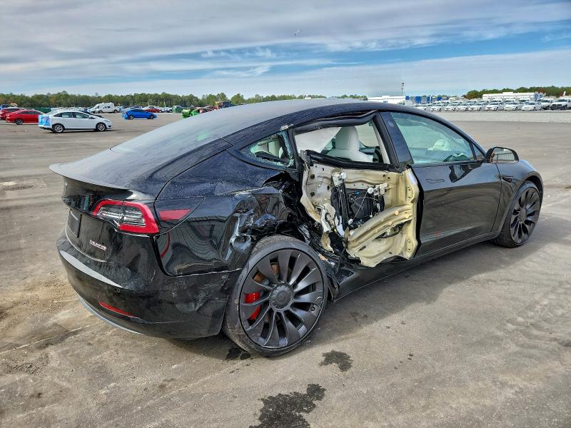 Photo 3 from auction – 2022 TESLA MODEL 3 with VIN 5YJ3E1EC2NF354456