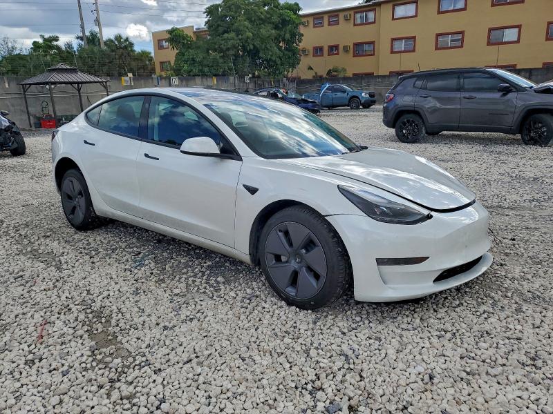 Photo 4 from auction – 2023 TESLA MODEL 3 with VIN 5YJ3E1EA0PF490750