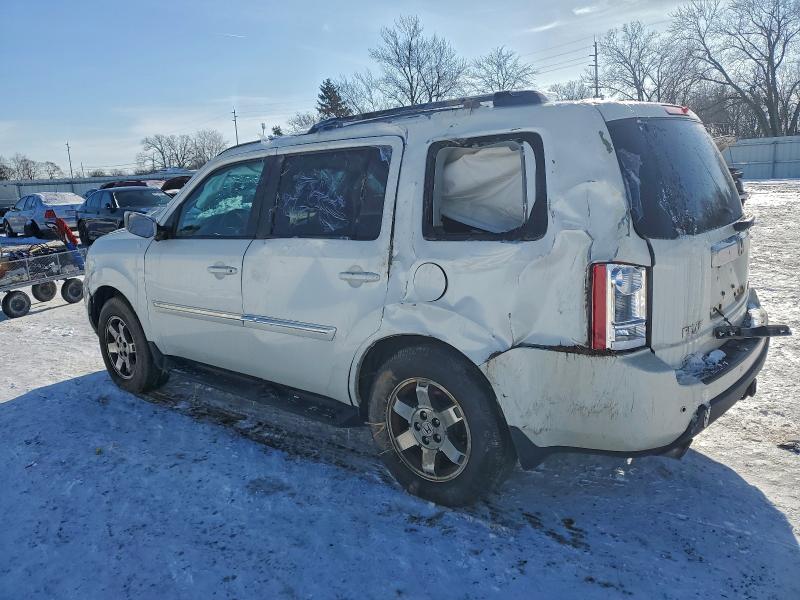 Photo 2 from auction – 2011 HONDA PILOT TOUR with VIN 5FNYF4H98BB073097