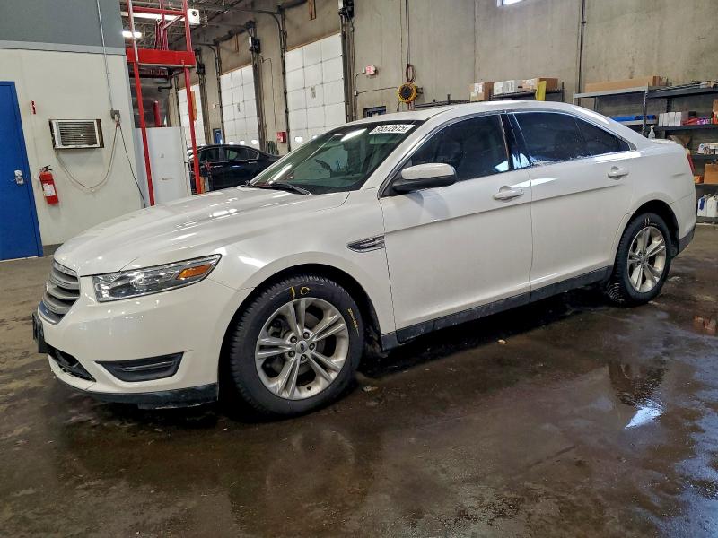 FORD TAURUS SEL 2014 with VIN 1FAHP2E82EG117608 - Photo from auction