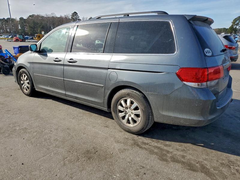 Photo 2 from auction – 2010 HONDA ODYSSEY EX with VIN 5FNRL3H44AB061569