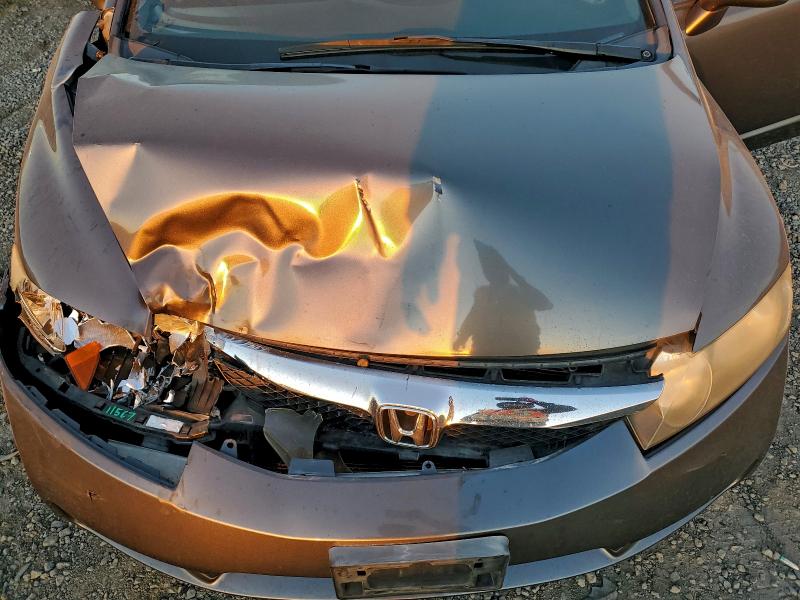 Photo 11 from auction – 2011 HONDA CIVIC LX-S with VIN 19XFA1F66BE028047