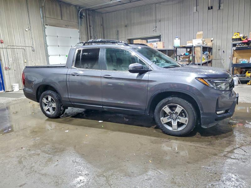 Photo 4 from auction – 2025 HONDA RIDGELINE with VIN 5FPYK3F52SB003334