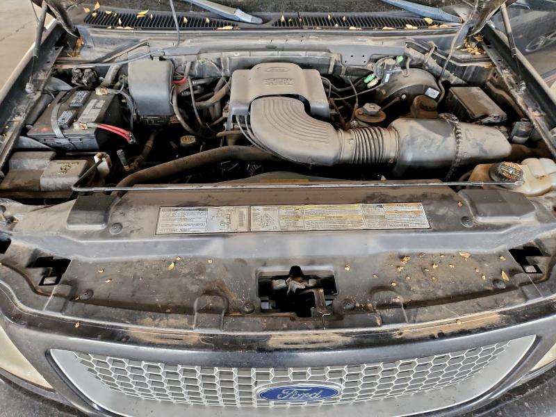 Photo 11 from auction – 1999 FORD F150 with VIN 1FTRX18W9XNA89923